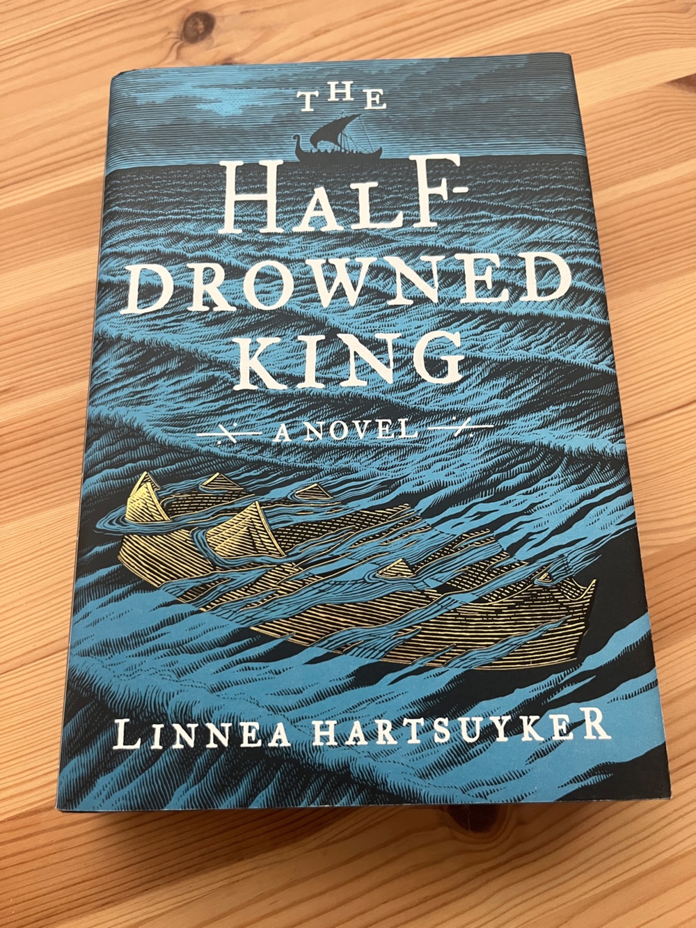 Blue and Gold 'The Half Drowned King' hardcover book By Linnea Hartsuyker